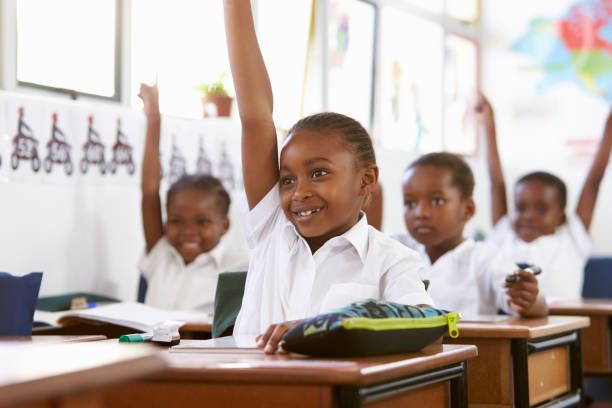 Learner answering a question in class